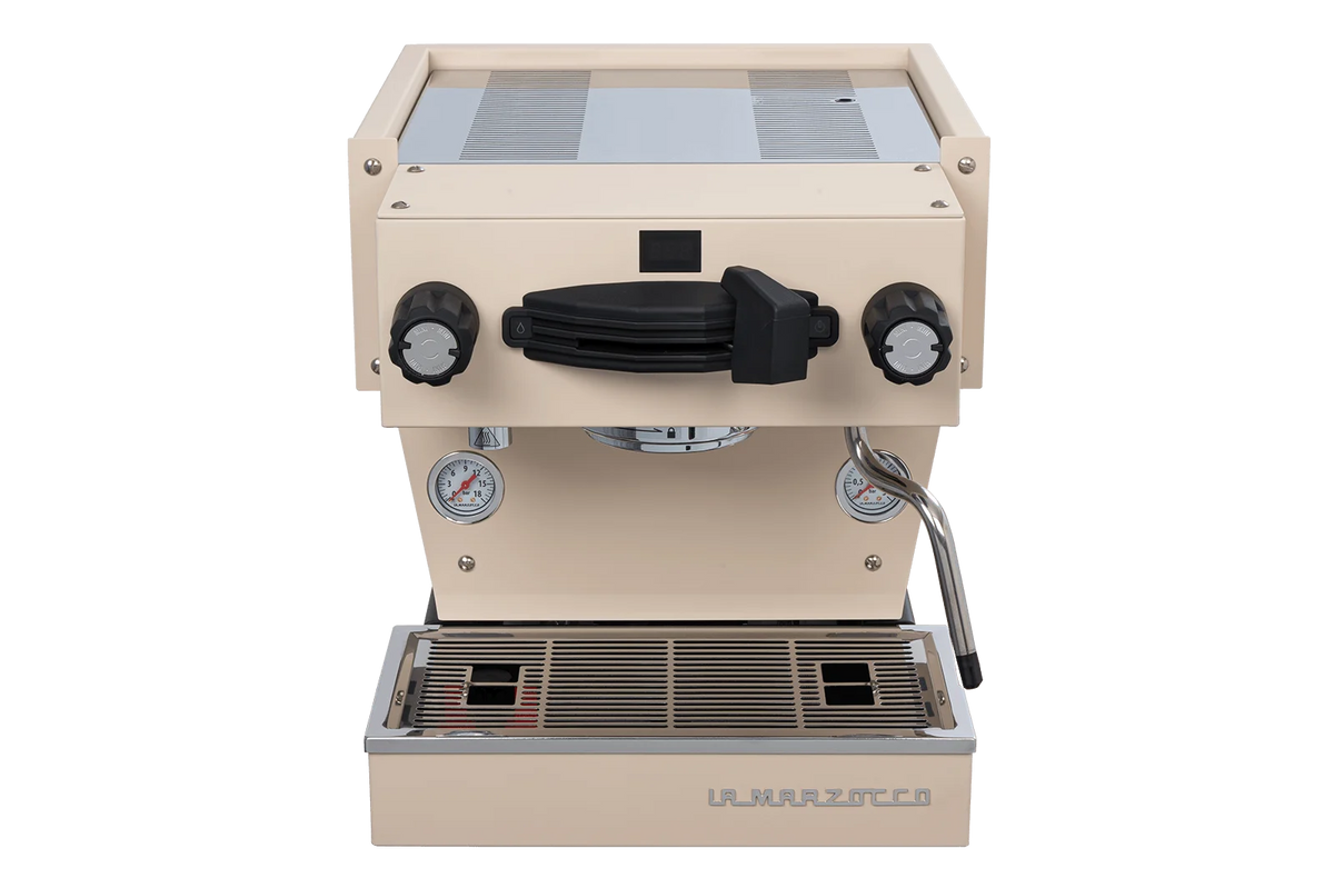 Cream espresso machine with visible brand name on a white background